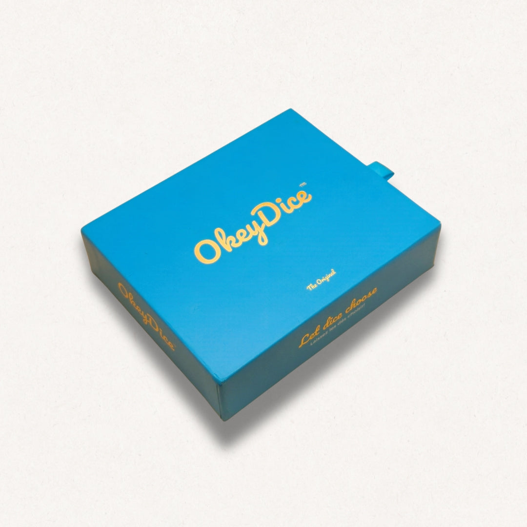Porte-clé OkeyDice à 4 dés décisionnels — silicone soft-touch et métal doré