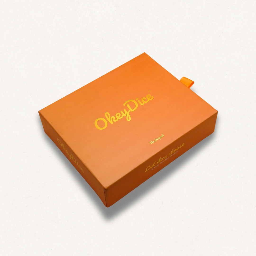 Porte-clé OkeyDice à 4 dés décisionnels — silicone soft-touch et métal doré